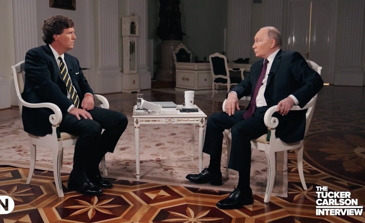 Tucker Carlson ir Vladimiras Putinas